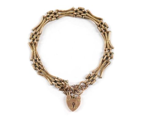 A 9ct gold gate bracelet, with bowed outer bars, to heart shaped padlock clasp and safety chain, Birmingham, 9.93gCondition r