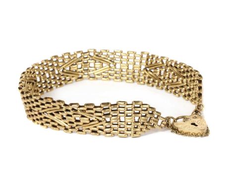 A 9ct gold gate bracelet, with chevron links, to heart shaped padlock clasp, London 1995, approximately 195mm long, 10.04gCon