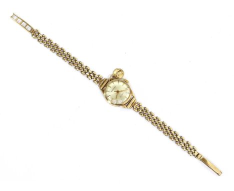 A ladies' 9ct gold Rodania mechanical bracelet watch, 20mm diameter with a silvered dial, baton hour markers and centre secon