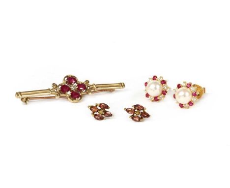 A pair of 18ct gold cultured pearl, diamond and ruby cluster earrings, with post and flat plate scrolls, common control mark,