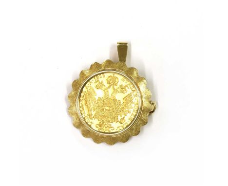 An Austrian ducat coin brooch/pendant, the 1915 restrike coin bezel set to a scalloped frame with Florentine finish, to pin, 