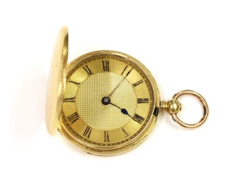 A gold key wound hunter fob watch, 35mm diameter, with circular barley engine turned engraving to the covers, to gilt dial wi