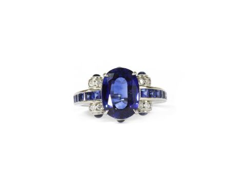 A sapphire and diamond ring, with an oval mixed cut sapphire, with a stated weight of 4.39ct, four claw set to a double galle