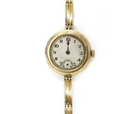 A Continental ladies' gold mechanical bracelet watch, 27mm diameter, with a silvered dial, black Arabic numerals, blued spade