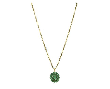 A 9ct gold emerald cluster pendant, an oval mixed cut emerald, to three row surround of round mixed cut emeralds, all claw se