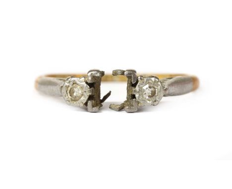 An 18ct gold ring mount, with a vacant centre collet, damaged, with an eight cut diamond grain set to an illusion collet at e