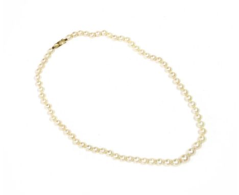 A single row graduated cultured pearl necklace, 6 to 9.2mm in size, strung knotted, to a 9ct gold safety clasp, Birmingham 19