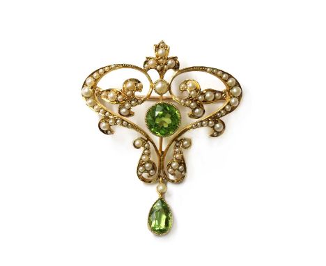 An Edwardian gold peridot and split pearl brooch/pendant, with a circular mixed cut peridot, milligrain set to the centre, to
