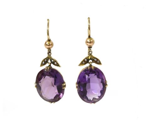 A pair of gold amethyst and split pearl drop earrings, with an oval mixed cut amethyst, approximately 14 x 11mm, claw set wit
