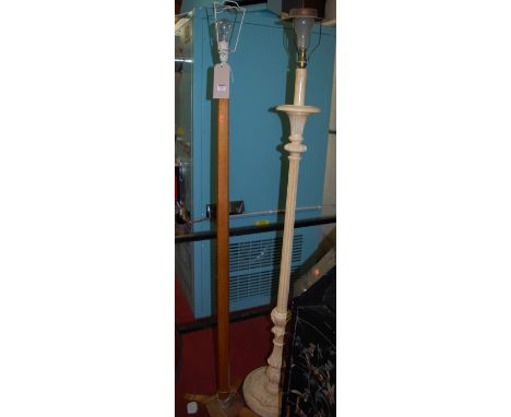 An early 20th century octagonal oak standard lamp; together with a classical style white painted example (2) 