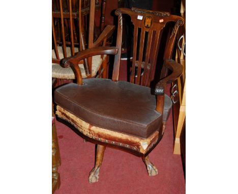 A late 19th century mahogany Chippendale style revolving desk chair; together with a 1930s oak revolving desk chair (2) 