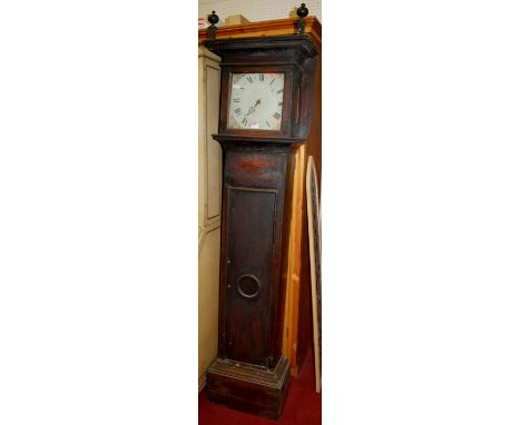 A late 18th century fruitwood longcase clock, having a painted square dial, and 30 hour movement (lacking pendulum and weight