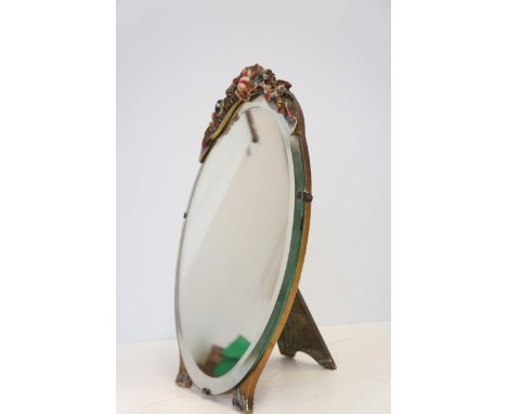 An original floral bevelled free standing mirror Height 47 cm 