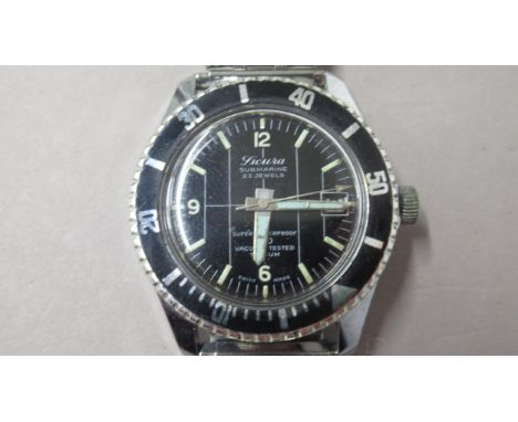 SICURA. Submarine. 1960's divers watch 23 jewel. Manual. Black dial and date at 3. 36mm. Working in saleroom 