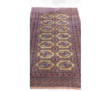 A hand knotted vintage Afghan rug, 213cm x 130cm 