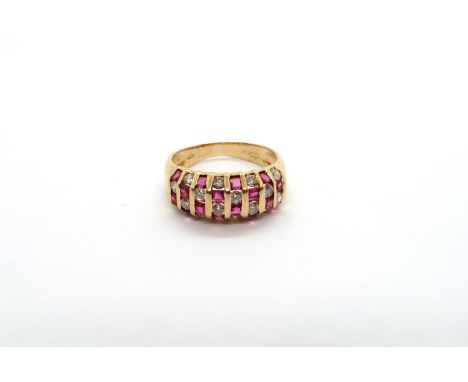 An 18ct (hallmarked) yellow gold diamond and ruby ring size L.M - weight approx 4 grams 