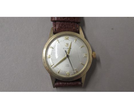 A gents 9ct gold cased Cyma Watersport manual wind wristwatch - case approx 33mm - working in the saleroom - back engraved da