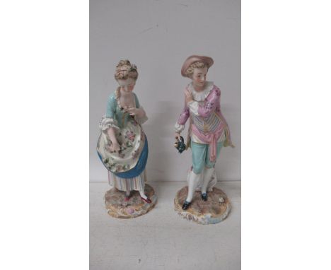 A pair of Continental porcelain figures of a Gallant &amp; Lady - Meissen crossed swords mark to base - 29cm