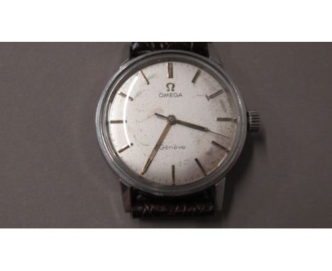 A gents Omega Geneve Seamaster stainless steel case, manual wind wristwatch - case 34mm - working in the saleroom 