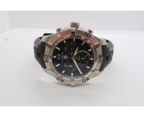 A Tag Heuer Aquaracer Quartz 6000 Chronometer in full working order with box and papers - in good condition 