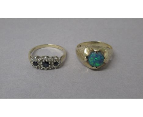 Two 9ct rings (hallmarked) doublet opal size R and sapphire and diamond size Q - total weight approx 6.6 grams 