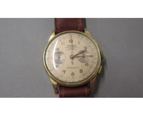 An 18ct yellow gold cased gents Docker Swiss chronograph manual wind - for repair - round case approx 38mm - not currently wo