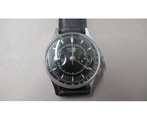 SEKONDA. Chronograph 1960's stainless steel case. 35mm Manual. Black dial. leather strap. working in the saleroom 