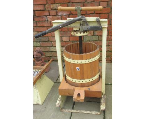 A vintage apple crusher and apple press 