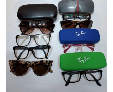 A group of sunglasses and prescription glasses to include Guess brown over-sized sunglasses with branded case, prescription P