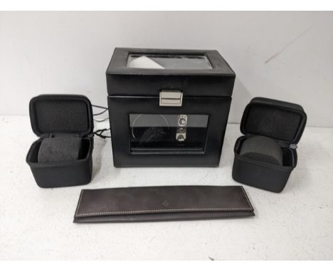 a Patek Philippe leather watch case along with three watch carriers to include two Breitling single watch cases, and a watch 