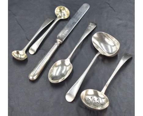 A Victorian sugar sifting spoon of Old English pattern having bright-cut geometric design to the handle and CR engraved to th