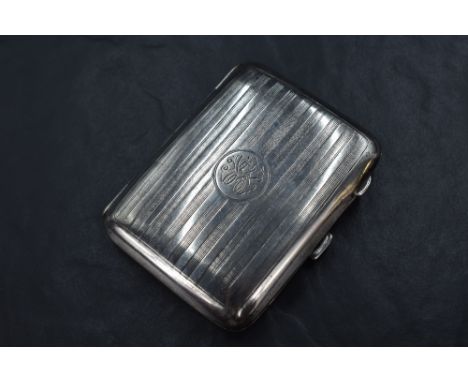A George V silver cigarette case, having vertical engine turned decoration with a circular cartouche engraved 'WA', marks for