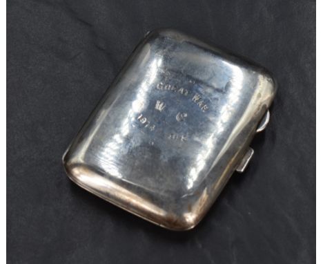 A George V silver cigarette case of rounded rectangular form engraved Great War, W.C., 1914-1918 to the front, having an engr