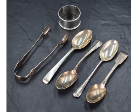 An assortment of silver flatware, including a pair of Victorian sugar tongs having scroll decoration, marks for London 1876, 