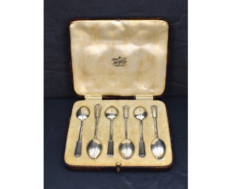 A cased set of six George VI teaspoons, having decorative enamel to terminals, marks for Birmingham 1939, maker Turner &amp; 