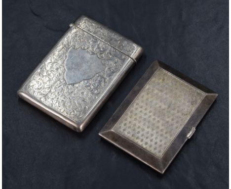A George V silver cigarette case of rectangular form, having engine turned decoration to both sides, marks for Birmingham 192