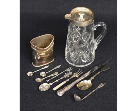 An assortment of silver and white metal wares including a silver mounted cut glass pitcher, marks for Birmingham 1930, rubbed