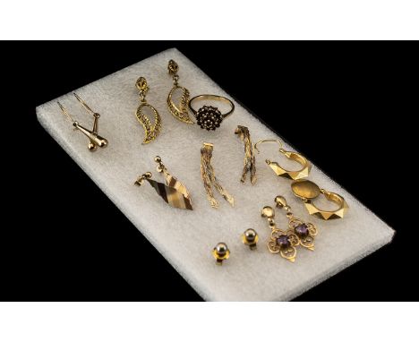 Small Collection of Gold Items, to include seven pairs of earrings, and a 9ct garnet ring.