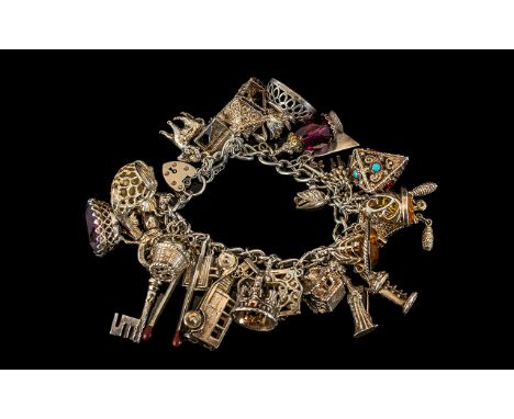 Vintage Sterling Silver Superb and Heavy Charm Bracelet, Loaded with 28 Large Silver Charms, Includes Some Expensive Ones - P