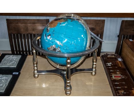 Lapis Gemstone Globe, set with gemstones, mounted on steel tripod stand, with four legs.  Measures approx 20" tall x 20" diam