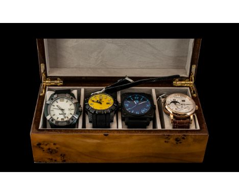 Collection of Five Fashion Watches, housed in a wooden case, comprising Timberland Gent's watch with white face, Jaeger manua