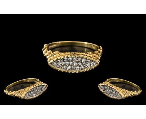 An 18ct Gold Diamond Set Dress Ring textured mount pavee set with round cut diamonds. Total weight 4.6 grams