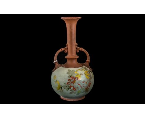 Watcombe of Torquay Terracotta Christopher Dresser style bottle vase, 8" tall, with twin scrolled handles and hand painted fl