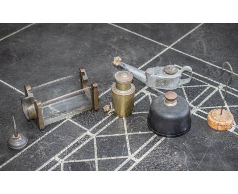 A Box of Miscellaneous Railway Accessories, to include an oil lamp, Morse code button, Great Western Railway miniature water 
