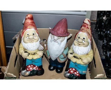 Two Vintage Terracotta Gnomes plus one other.