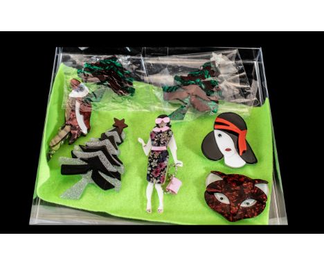 Collection of Reproduction Lea Stein Acrylic Brooches, comprising a fox face brooch, a silver and gold Christmas tree and two