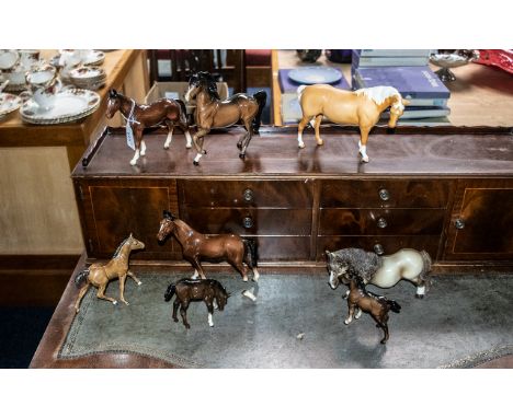 Collection of Beswick Horses, comprising three Beswick foals, two bay horses and a Bisque Palomino.  Together with a Beswick 