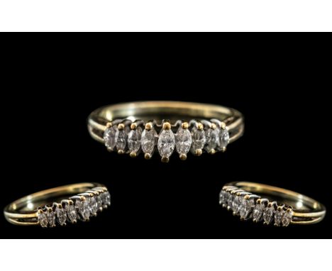 A Ladies 9ct Gold Dress Ring set with marquis cut diamonds .55 of a carat. Ring Size P - Q.