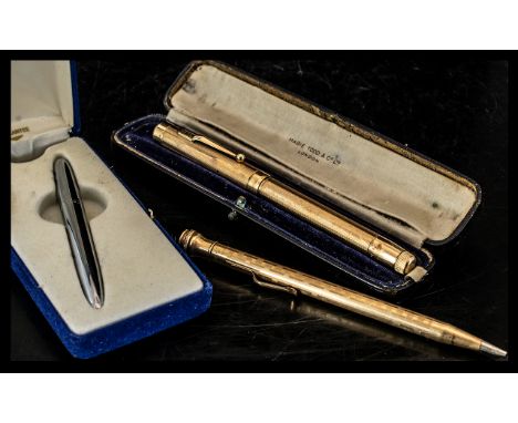 A Swan Mabie Todd &amp; Co of London Pen gold tone engine turned barrel and cap, monogrammed PHS, in fitted case, together wi