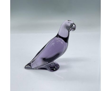 Vibrant purple crystal figure of a perched parrot. Baccarat mark. Dimensions: 3.75"L x 1.75"W x 4"HManufacturer: BaccaratCoun